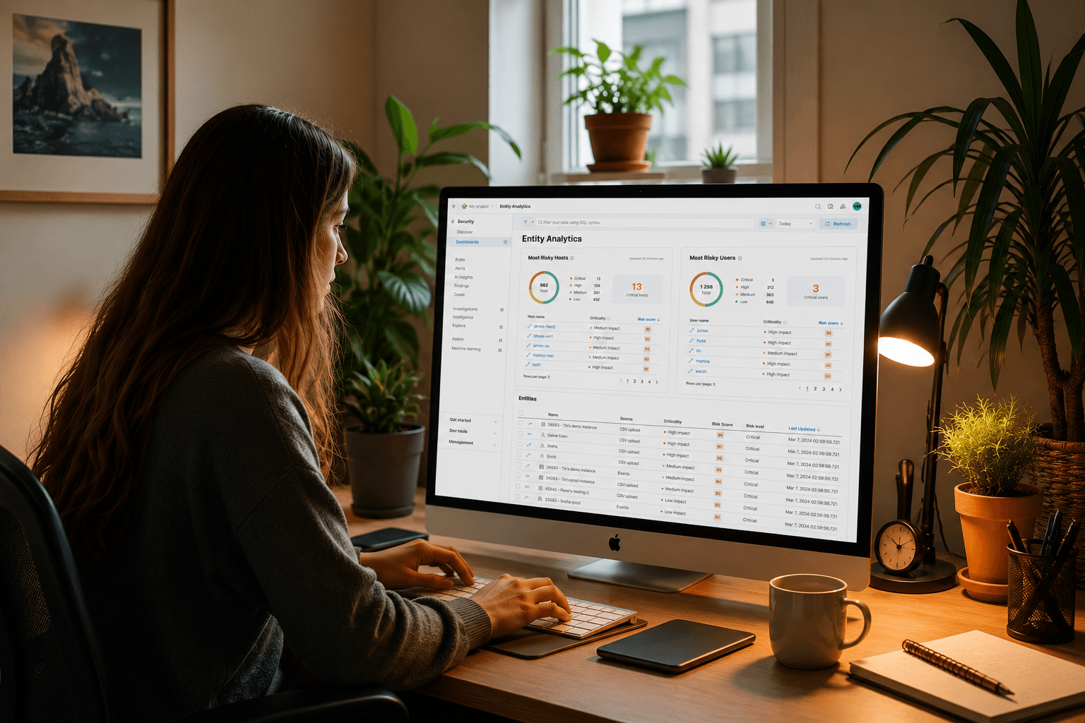 Entity Analytics risk dashboard on a MacBook Air